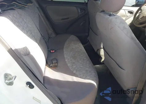 2000 Toyota Echo из США, поврежденный, VIN JTDBT1236Y0028362